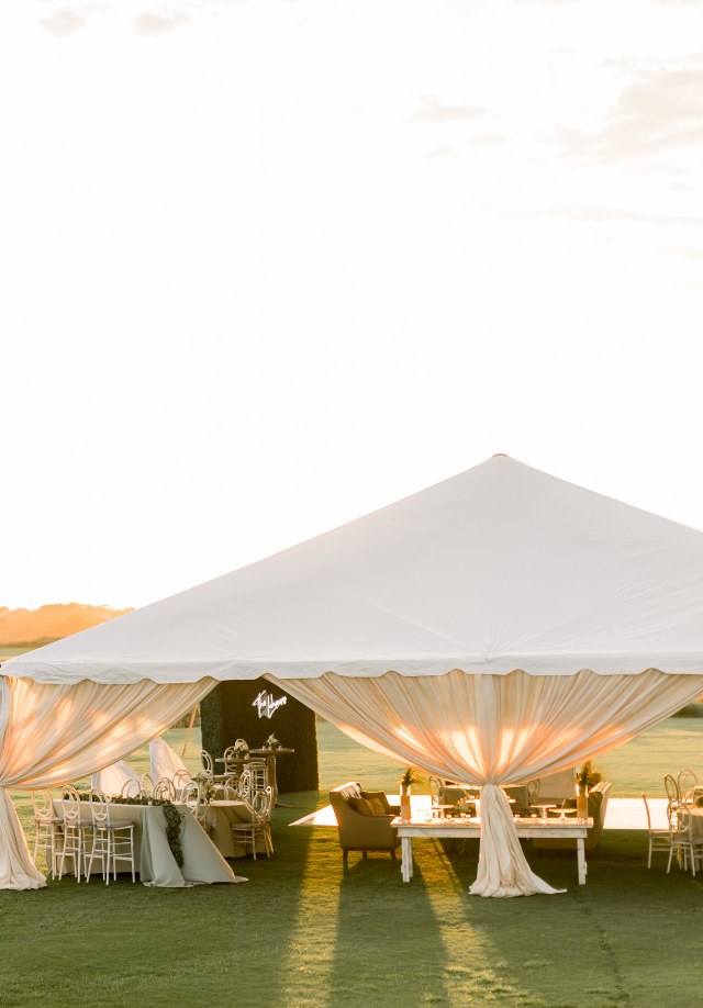 Draped reception with tablescapes and candlelight
